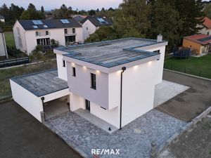 Einfamilienhaus in belagsfertiger Ausführung mit Echtholzparkett - große Terrasse - moderne Fassadengestaltung und Smarthome Technologie